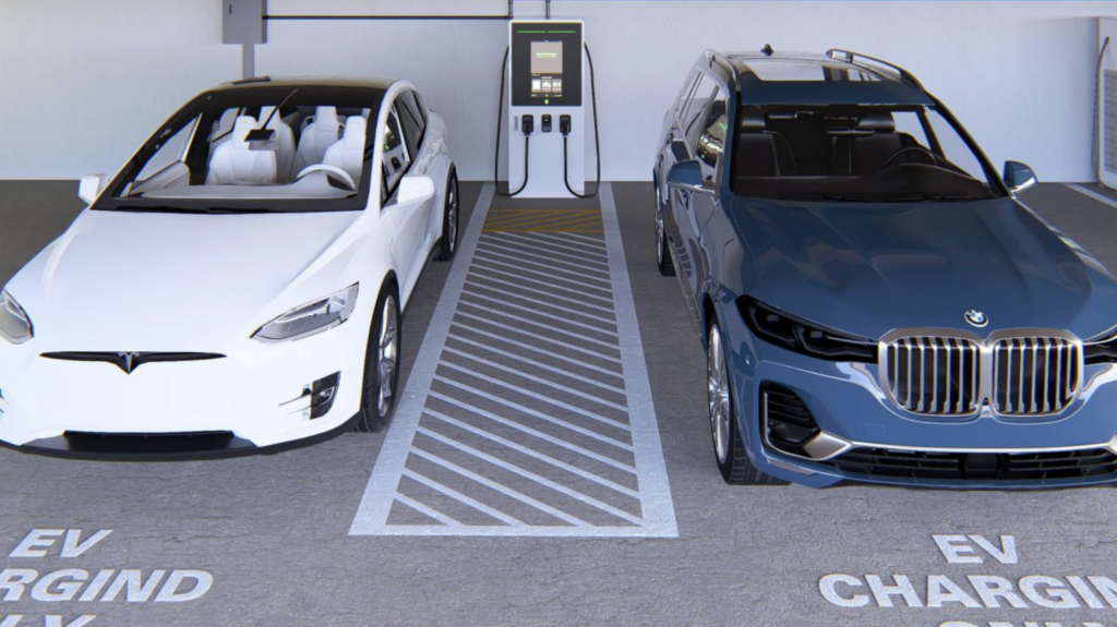 Illustration of a dual-port DC fast charger setup showing a centrally located unit serving two adjacent vehicles with cables extending to both sides